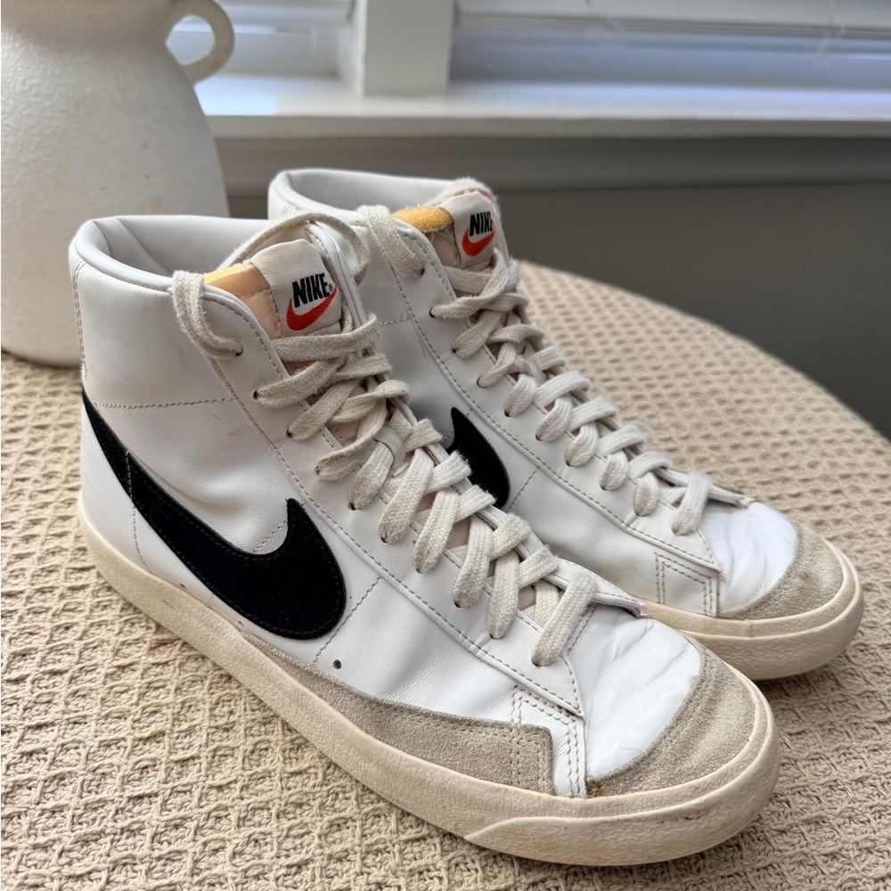 Nike Womens White High-Top Sneakers with Black Swoosh